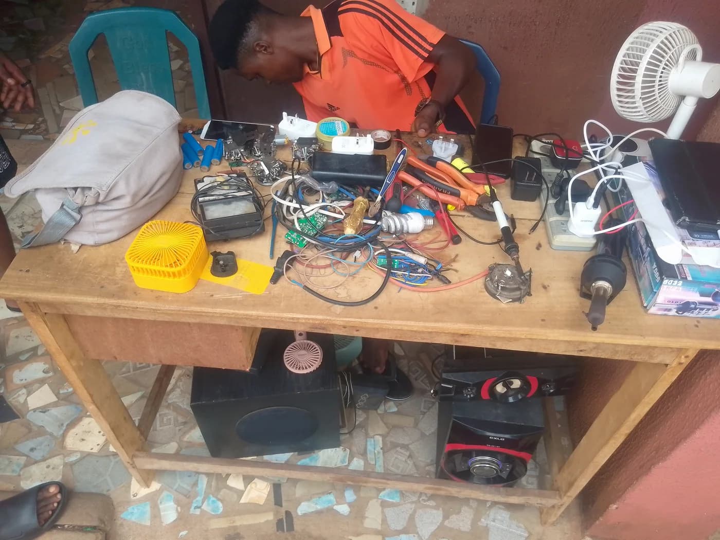 An electronics repair workbench with test equipment