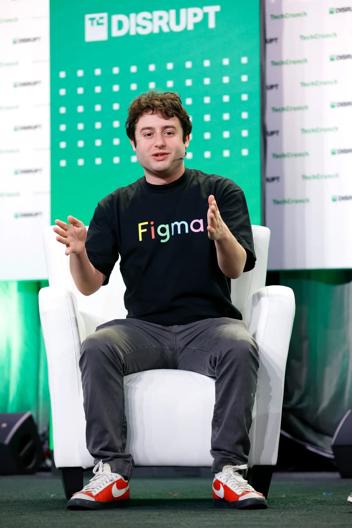 Dylan Field speaking at TechCrunch Disrupt in 2022