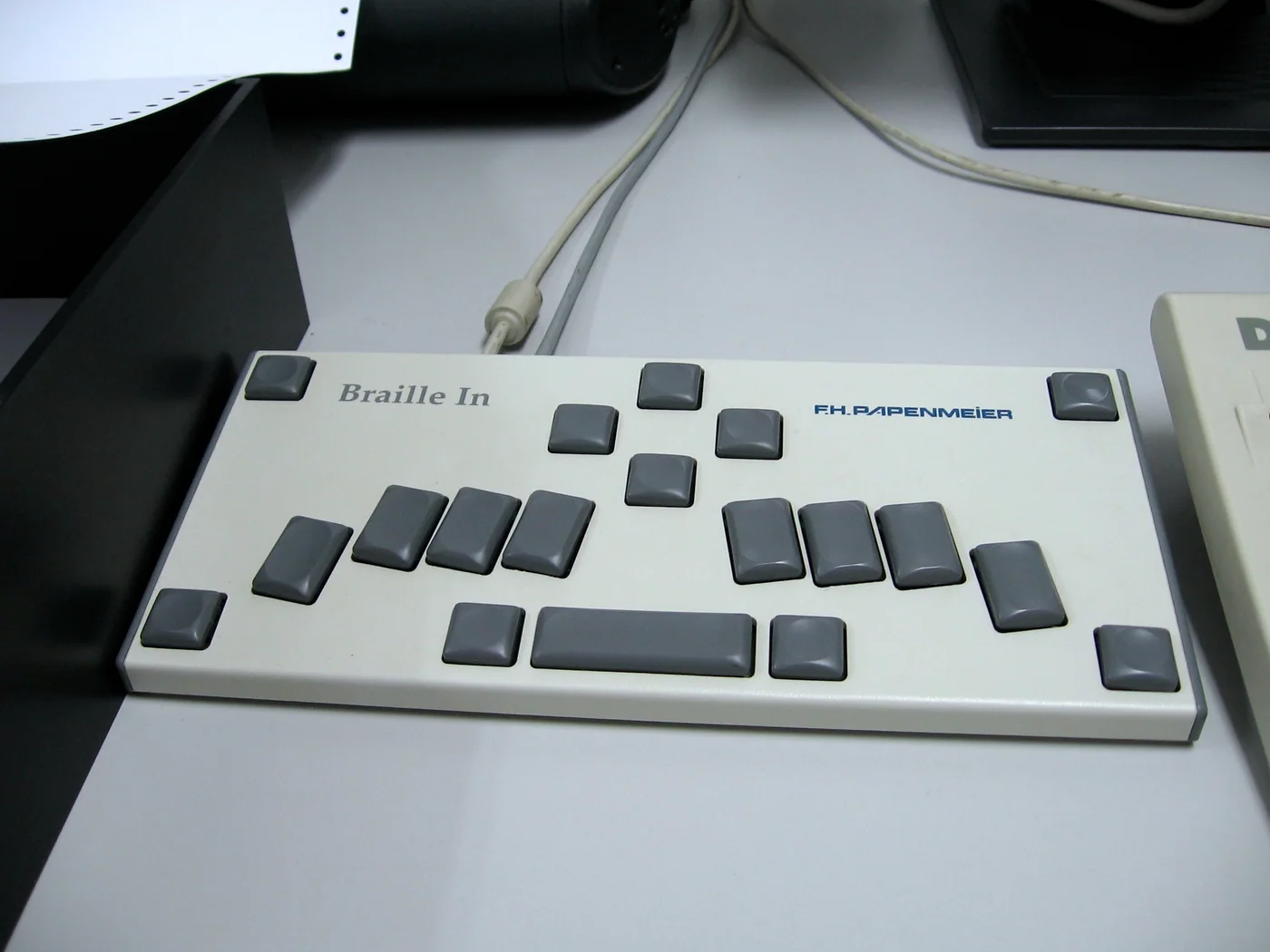 A Braille keyboard at the DASA museum, shown as an accessibility reference
