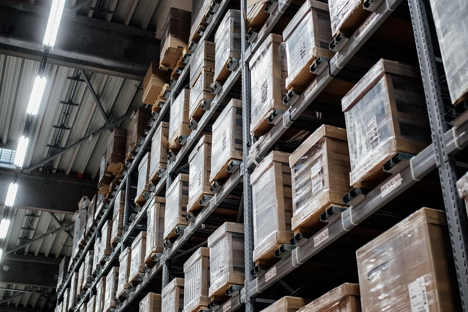 Warehouse storage racks and stacked pallets