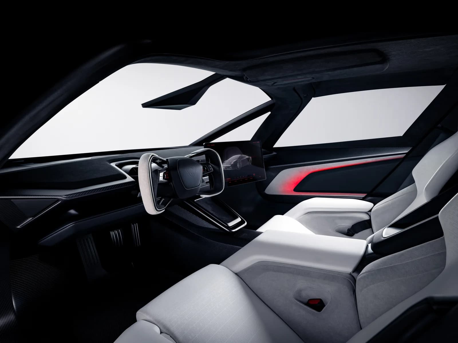 Tesla Roadster interior showing the yoke, displays and two-seat cabin