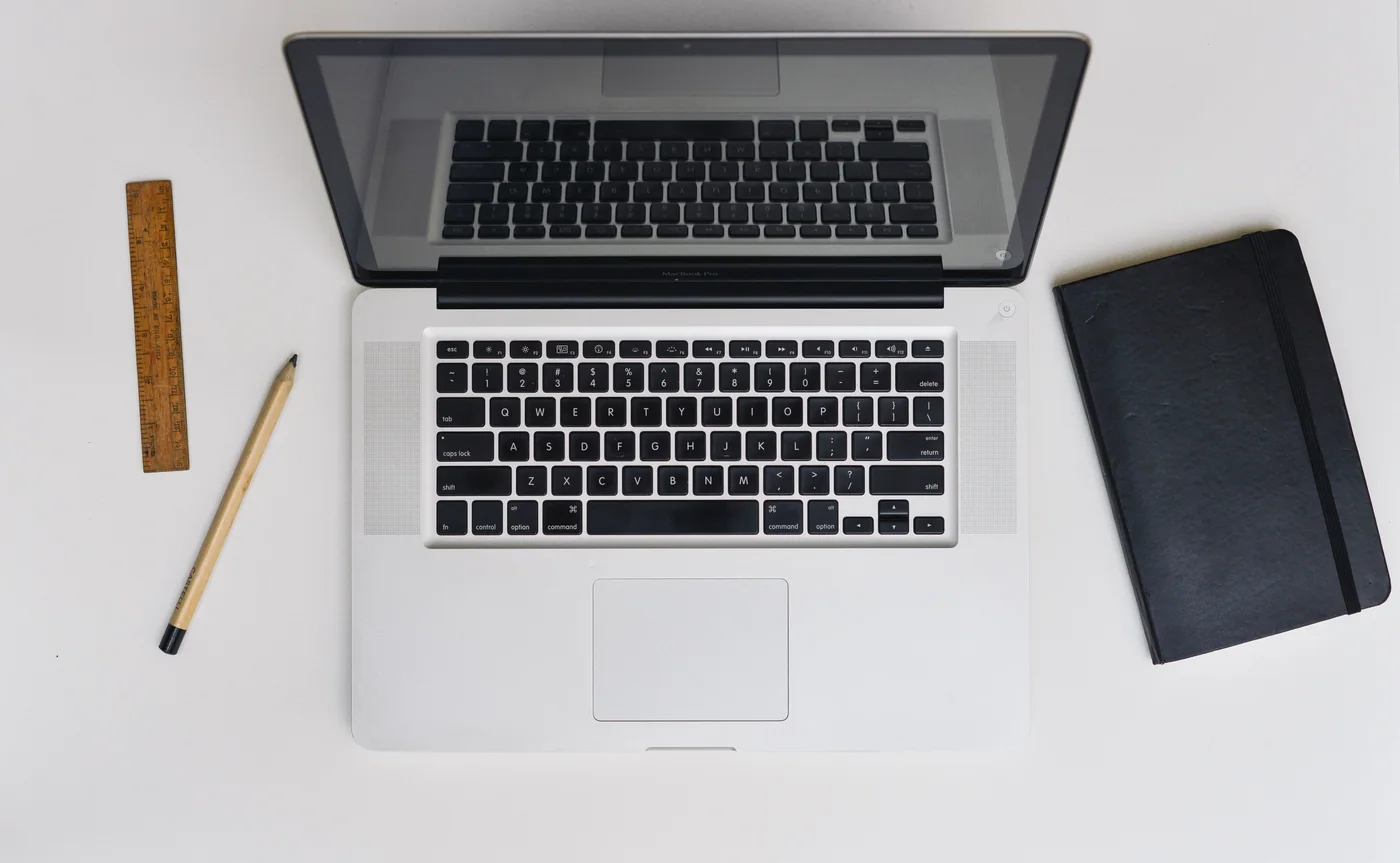 Reference photograph of a laptop on a working desk