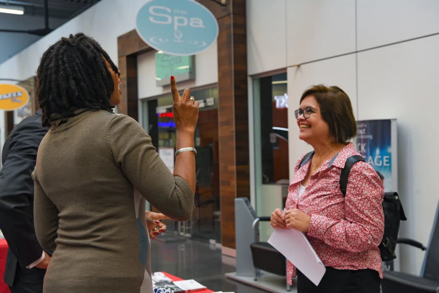 Archival reference photograph of visitors at a community job fair