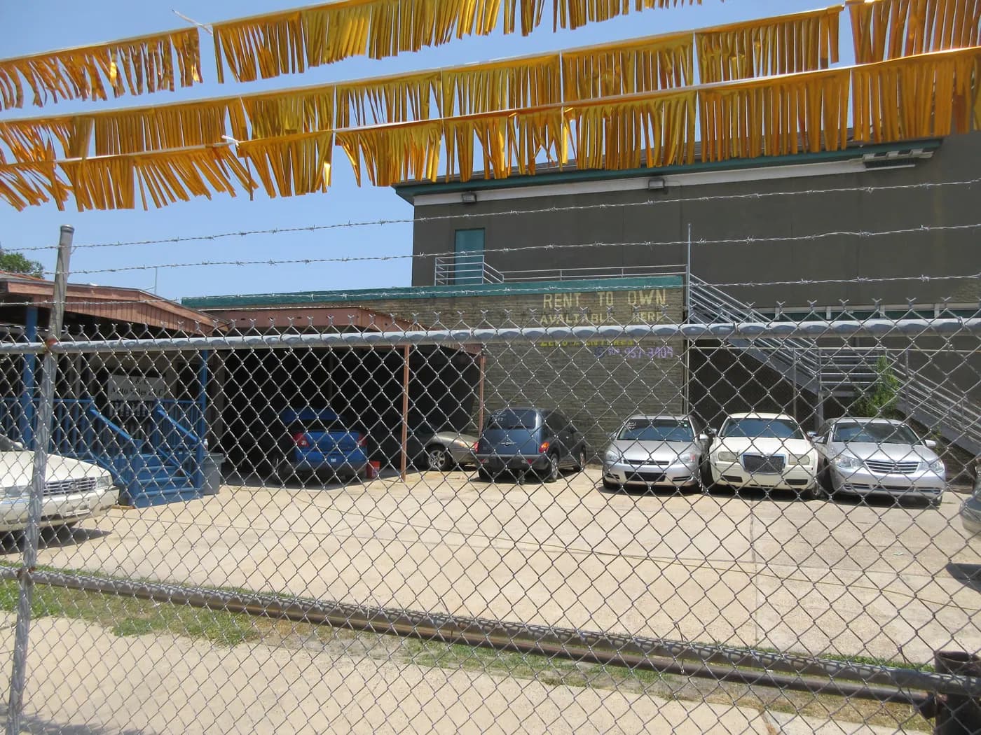 A used-car lot in New Orleans, shown as a general vehicle-purchase reference