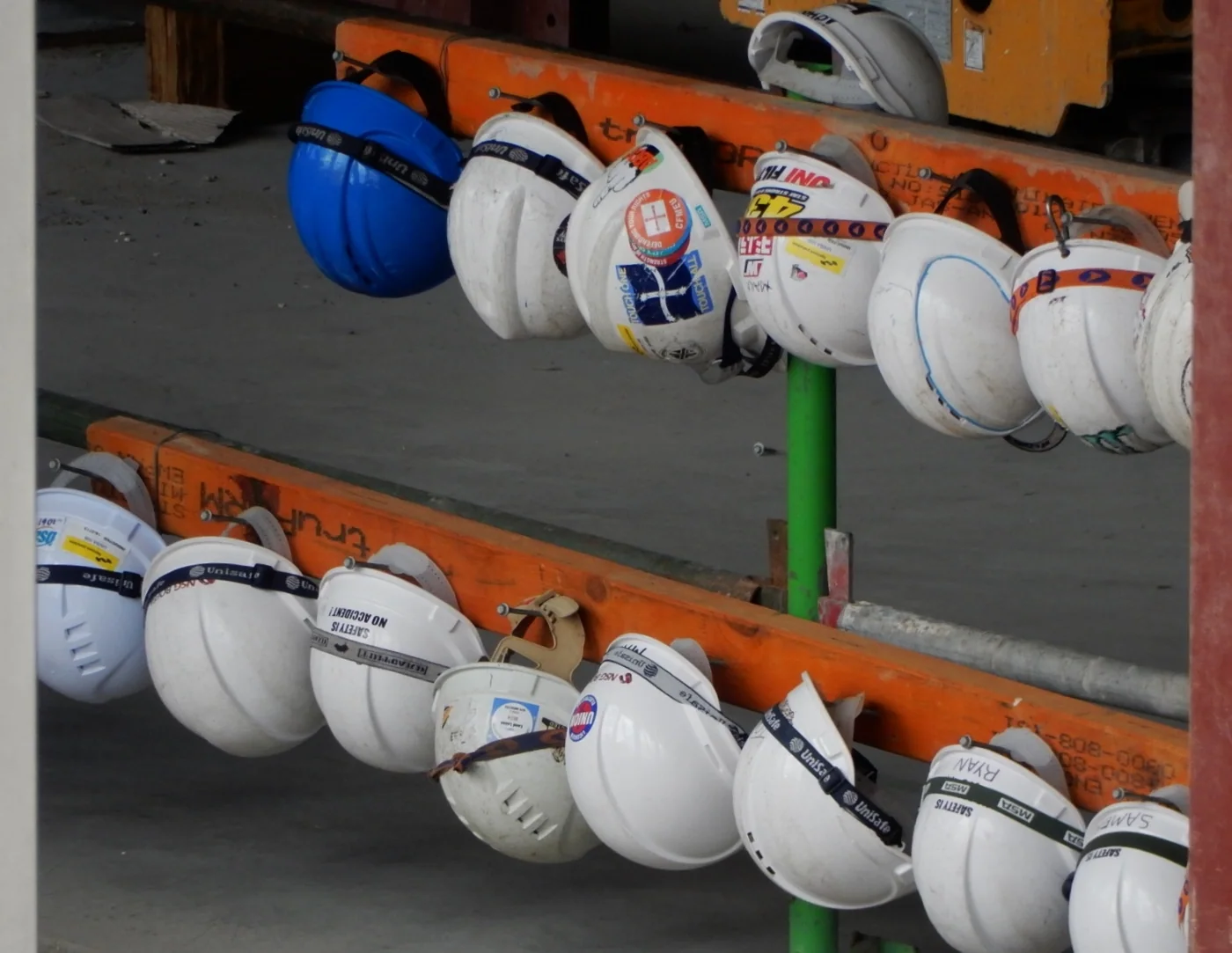 Safety helmets, shown as a workplace-safety reference