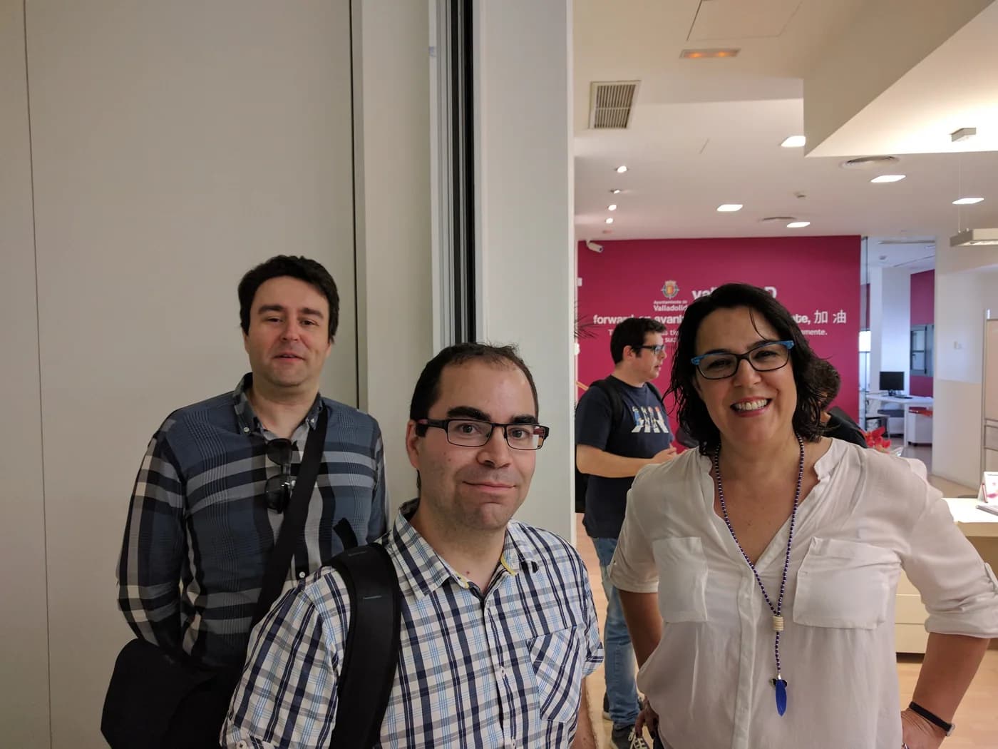 A meeting in a coworking space, shown as a professional-services reference