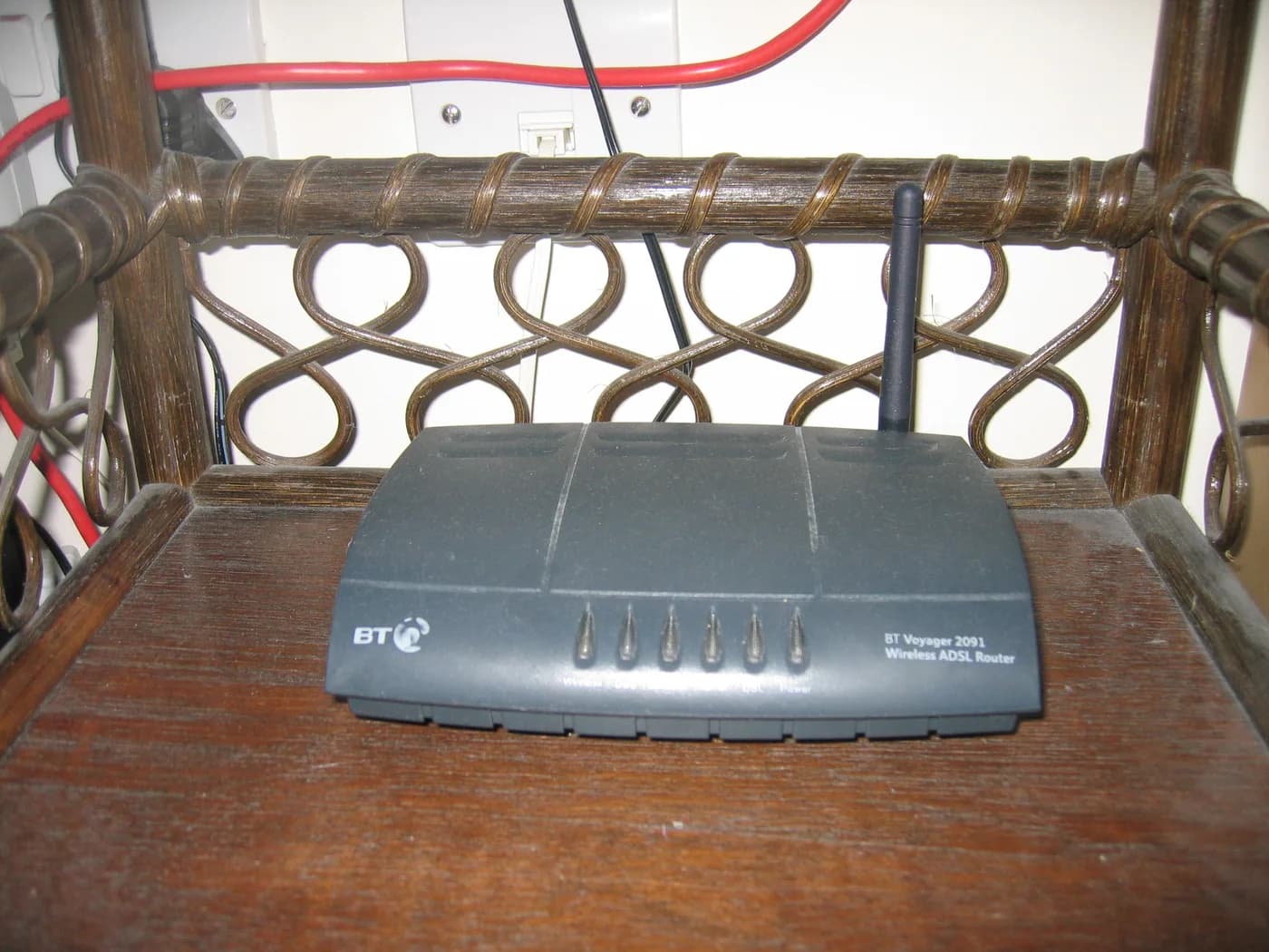 An older wireless router, shown as a network-equipment reference