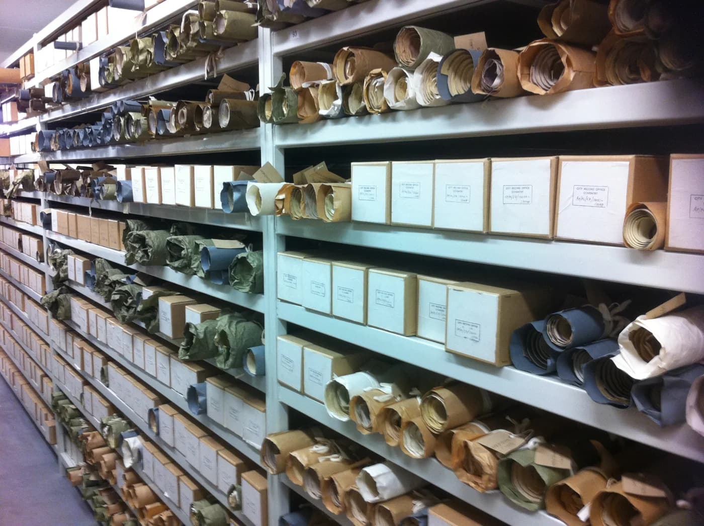 Documents on archive shelves at the Herbert history center