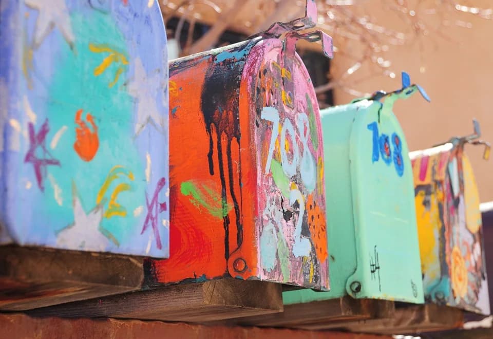 A group of mailboxes in Santa Fe, shown as a mail-service reference