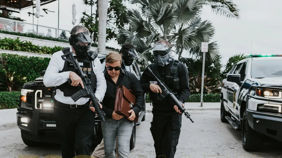 Security team and vehicles pictured on FSO Guard’s executive protection page
